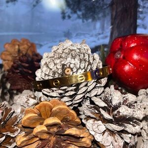 Gold-Tone Bracelet with Screw Motif